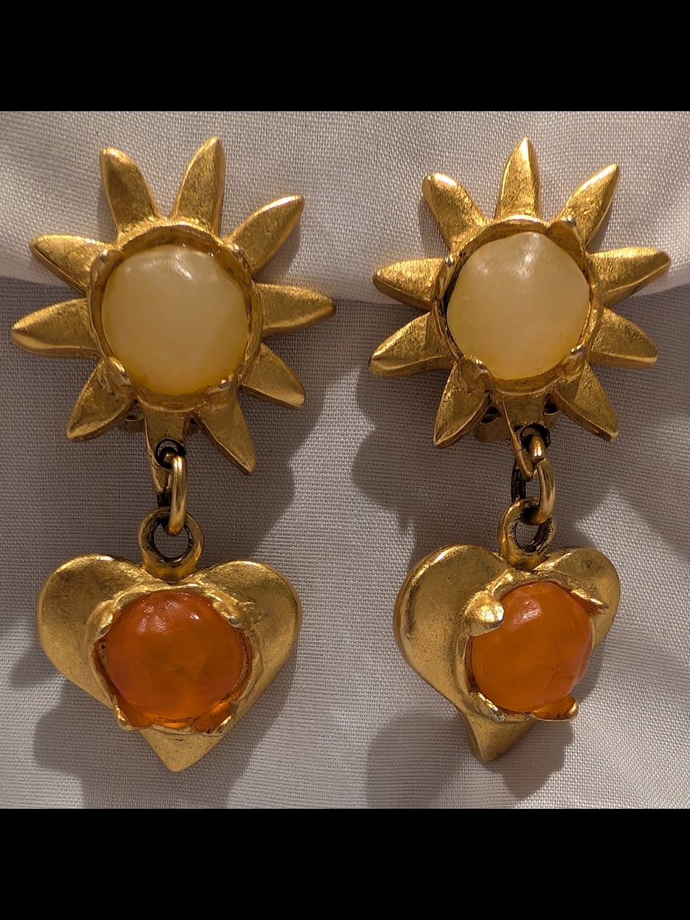 Gold Sunburst Drop Earrings with Cream Centers and Orange Heart Stones